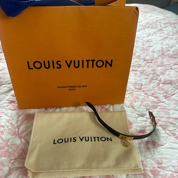 Louis Vuitton Women’s Logomania Leather and Gold Charm LV Adjustable Bracelet - Picture 2 of 7